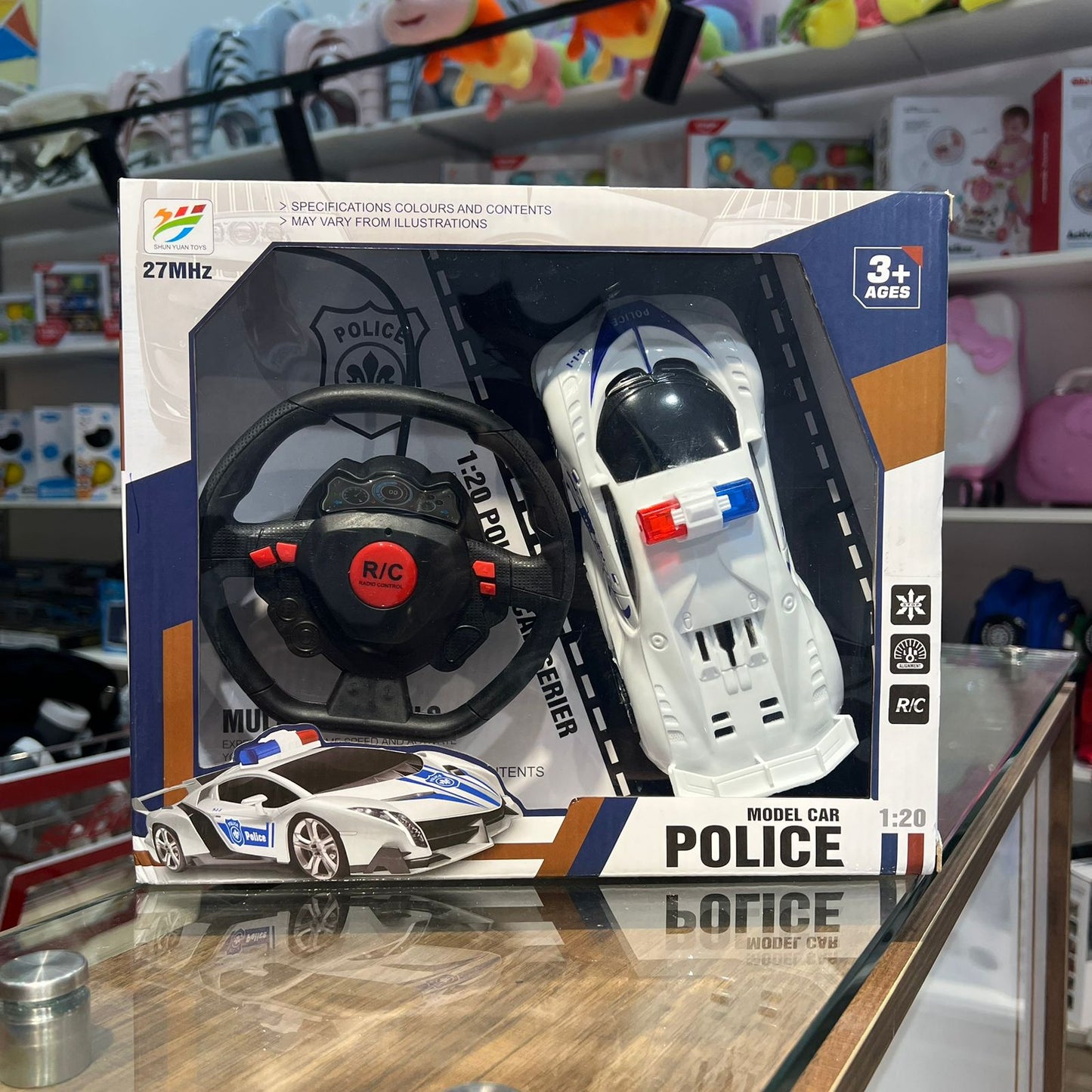 voiture de police télécommandée avec volant